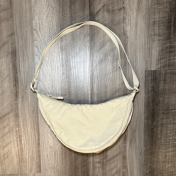 Uniqlo Handbags - Uniqlo Small Nylon Cream Shoulder Bag